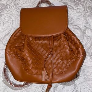 Brand new still in wrapping brown backpack